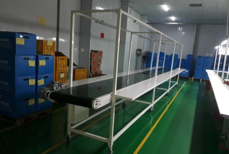 Máy băng tải vận chuyển giày dép